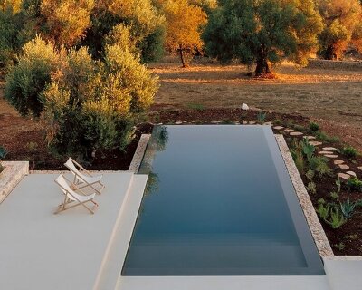 tela architettura revives abandoned concrete shell into italian countryside refuge