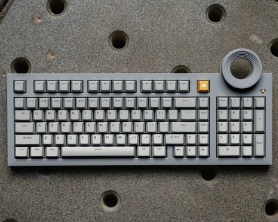 cement-like mechanical keyboard reimagines the style of tadao ando’s concrete church