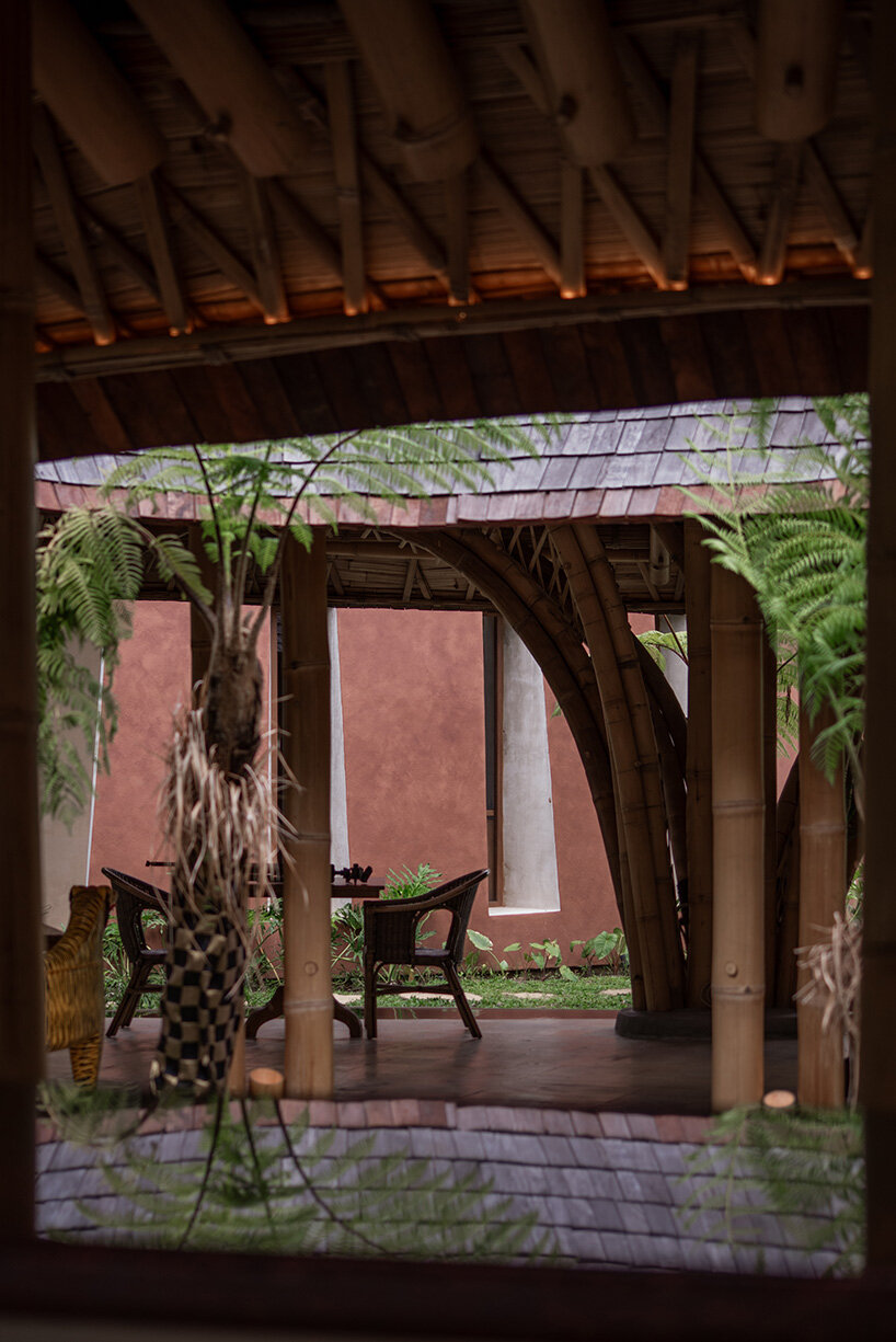 circular bamboo roof collects rainwater at balinese restaurant by pablo luna studio