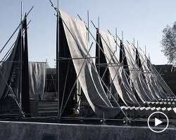 concrete canvas wraps 18 scaffolding monoliths for monumental installation in florence
