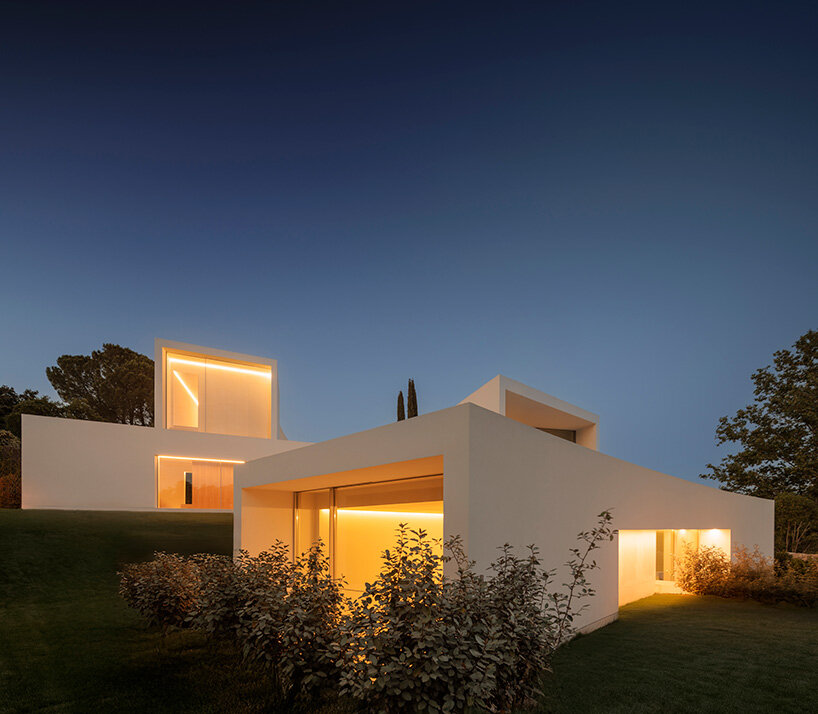 curved bodies organize sequence of gardens in spanish home by fran silvestre arquitectos
