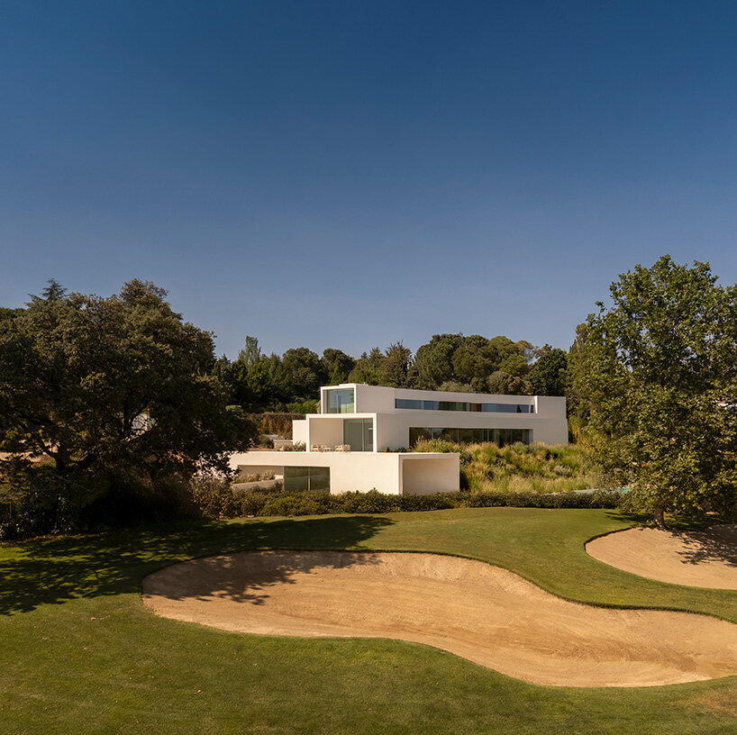 curved bodies organize sequence of gardens in spanish home by fran silvestre arquitectos