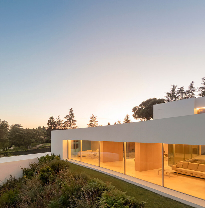 curved bodies organize sequence of gardens in spanish home by fran silvestre arquitectos