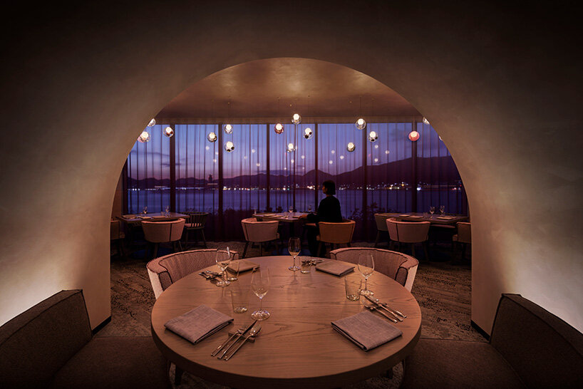 curved twin volumes shape the risonare shimonoseki hotel along japan's kanmon strait - 12