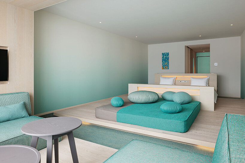 curved twin volumes shape the risonare shimonoseki hotel along japan's kanmon strait - 10