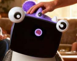 cyber pet for homes with stretchable neck shows playful emotions using interactive display