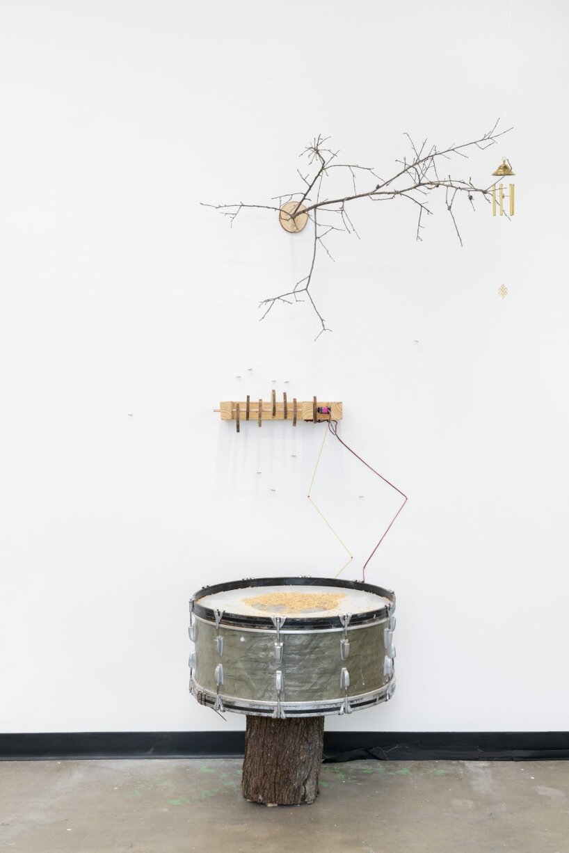 other sound sculptures fill the space as well, still made of recycled oak tree