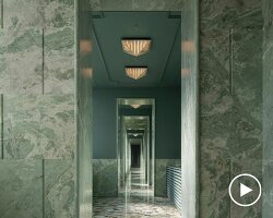 green marble clads gallery showroom’s immersive interiors in shenzhen