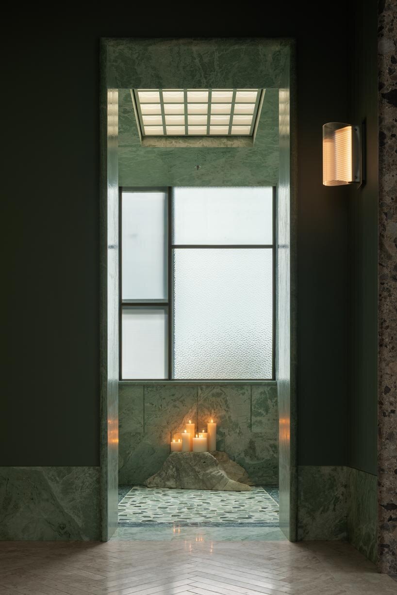 green marble clads gallery showroom&rsquo;s immersive interiors in shenzhen