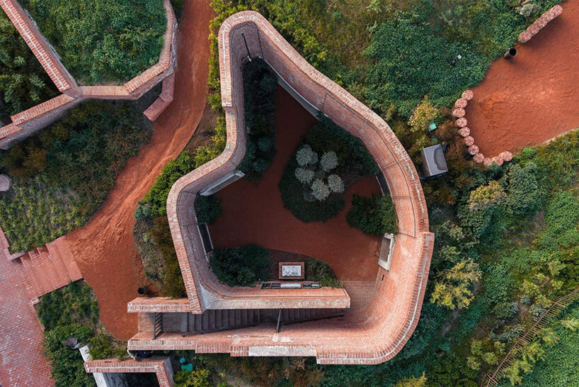 earth-covered domes and brick vaults shape liberation museum of manisa in turkey