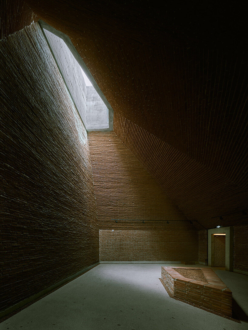earth-covered domes and brick vaults shape liberation museum of manisa in turkey