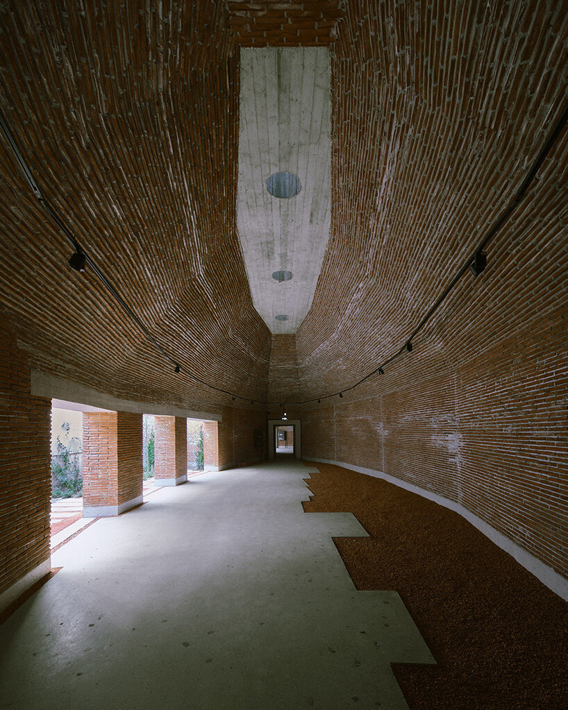 earth-covered domes and brick vaults shape liberation museum of manisa in turkey