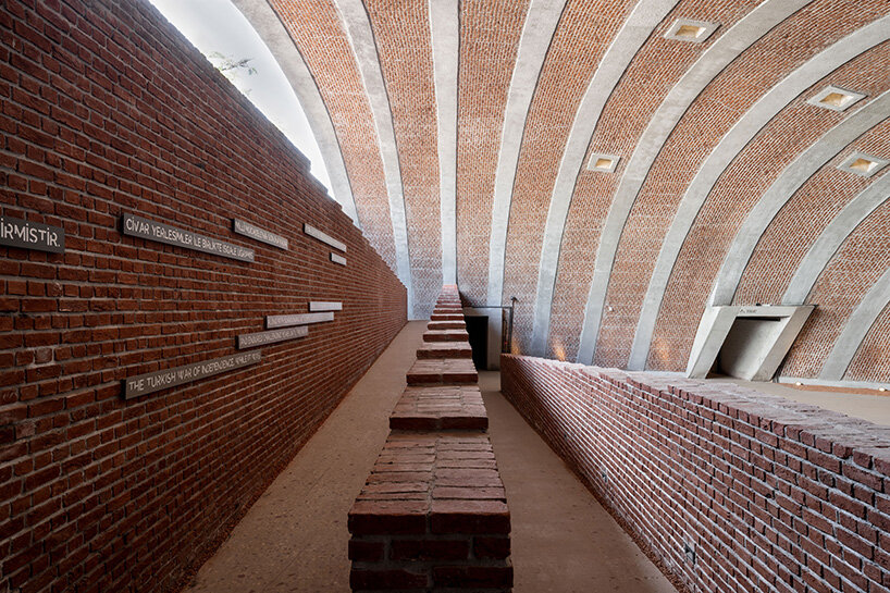 earth-covered domes and brick vaults shape liberation museum of manisa in turkey