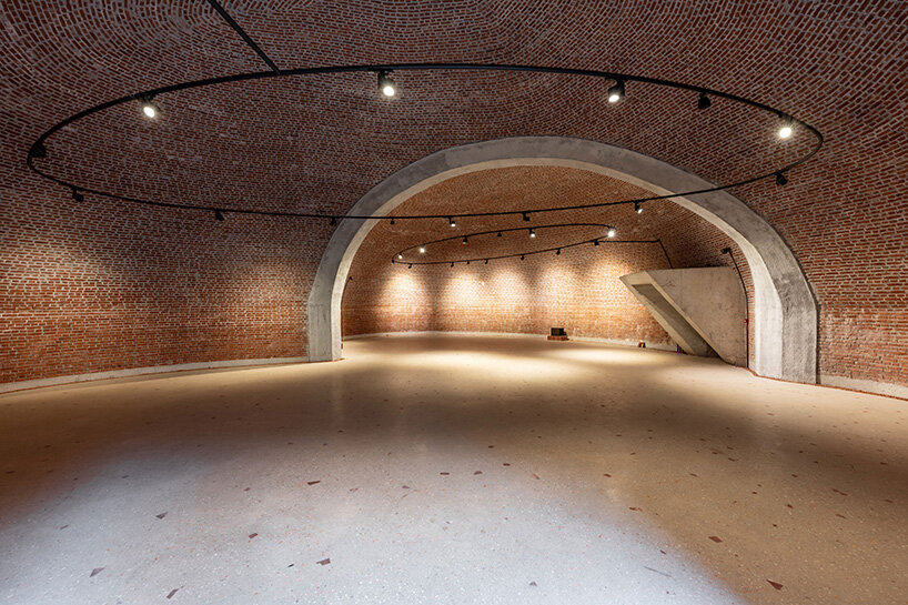 earth-covered domes and brick vaults shape liberation museum of manisa in turkey
