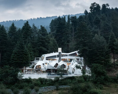 eila by MOFA studio realizes biomorphic art retreat in india through fluid architecture