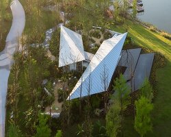 folded triangular roof planes shape luxerivers café along china's yangtze river
