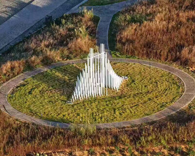 forest of steel pillars creates swinging installation enveloped in cloud-like mist in china
