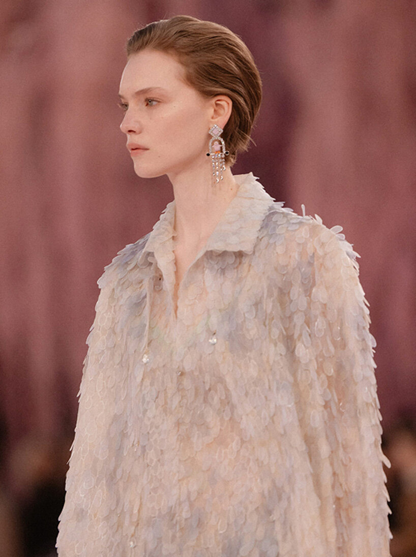 giant mushrooms populate dreamlike forest set inside the grand palais for chanel show