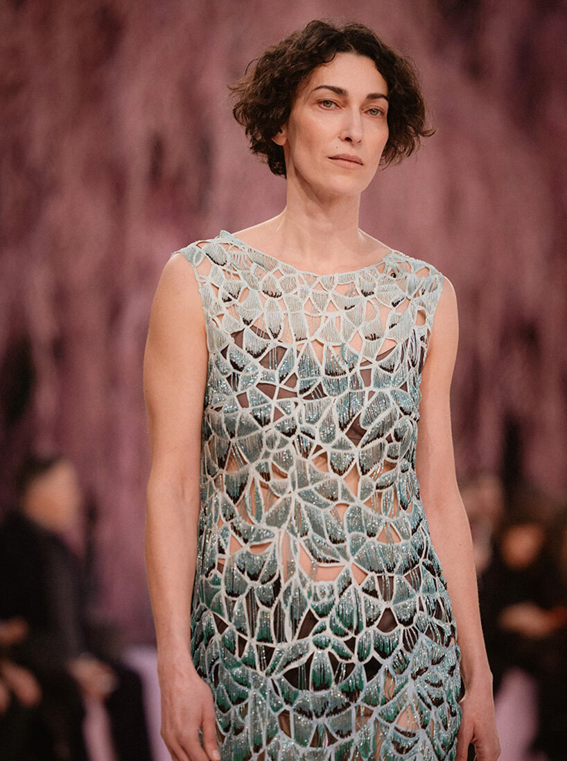 giant mushrooms populate dreamlike forest set inside the grand palais for chanel show