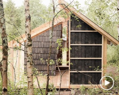 student collective builds fireplace shelter from reclaimed materials in northern norway