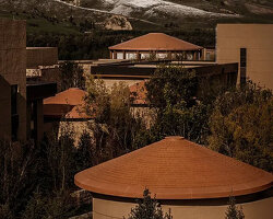 hotel by ccd reinterprets nomadic cultural patterns through dispersed brick volumes in china