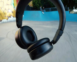 hybrid headphones twist into portable bluetooth speaker for outdoor and group listening