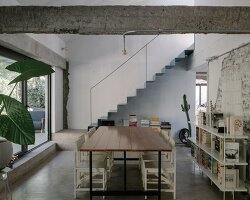 iván bravo weaves original brick fragments into casa tam renovation in chile