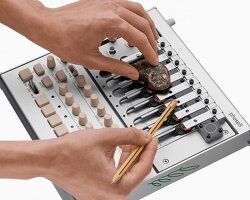 kalimba-like acoustic synthesizer produces sounds by touching, plucking or strumming it