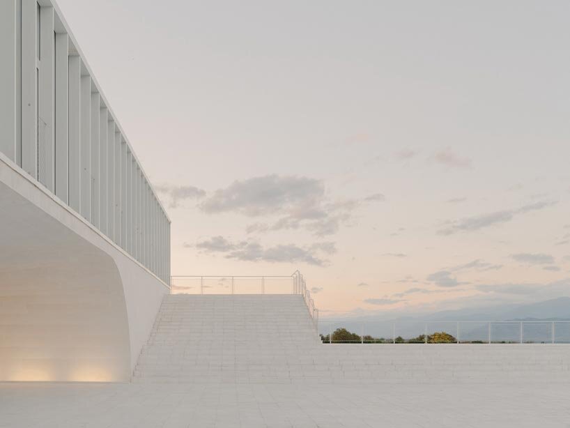 arches and voids carve winery&rsquo;s monolithic white facade in georgia