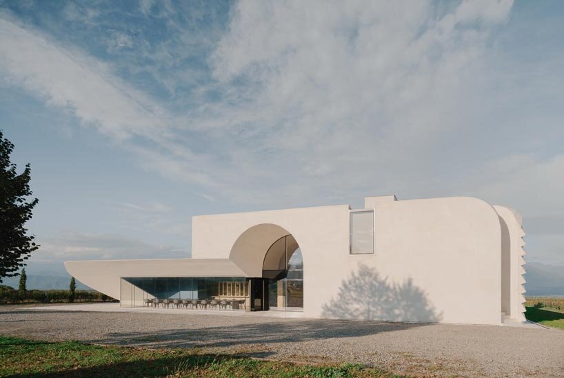 arches and voids carve winery&rsquo;s monolithic white facade in georgia