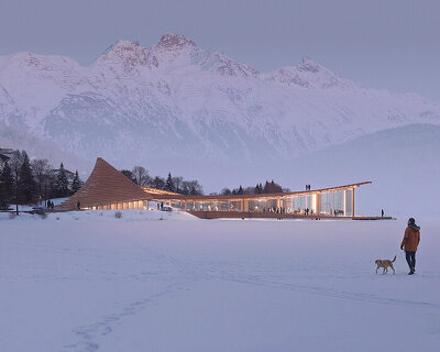 cluster of curved rooftops encloses .ket bureau's lakeside wellness pavilion for st. moritz