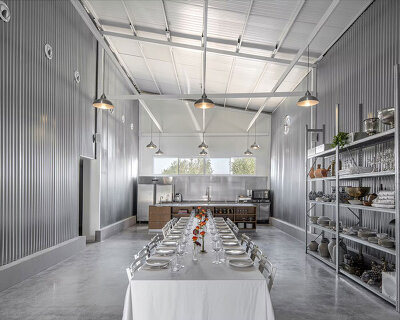 corrugated metal interiors reinvent vegetable storage fridge into industrial hospitality space