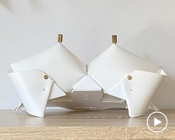 origami crab lamp folds into a softly glowing nightstand companion