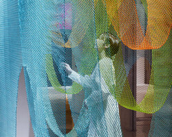 luminous layers of colored wire mesh weave tea ceremony house by moriyuki ochiai