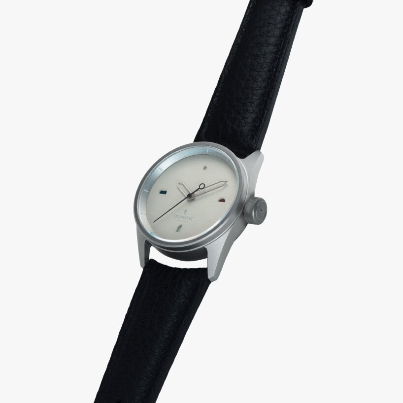 the dial itself is finished in a cool grey grain&eacute; texture