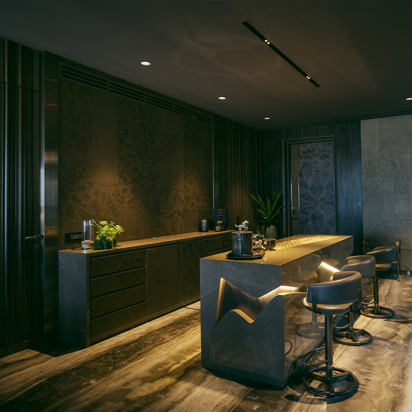 penthouse residence by metaphors blends neo-classical detail with brutalist geometry