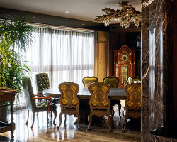 penthouse residence by metaphors blends neo-classical detail with brutalist geometry