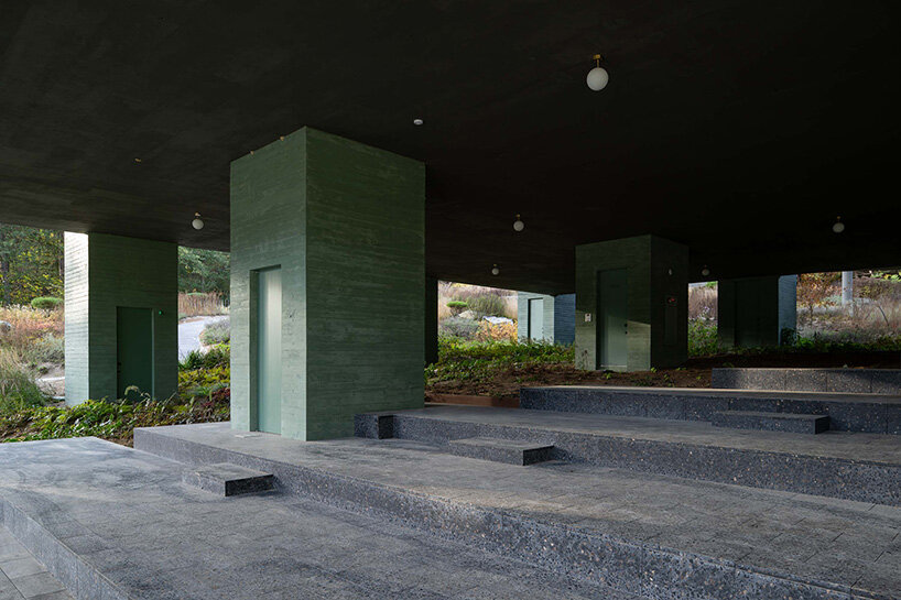 pezo von ellrichshausen raises field of inhabitable columns for restaurant in south korea