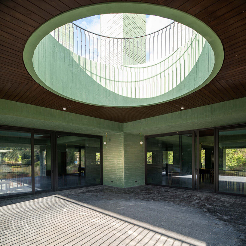 pezo von ellrichshausen raises field of inhabitable columns for restaurant in south korea