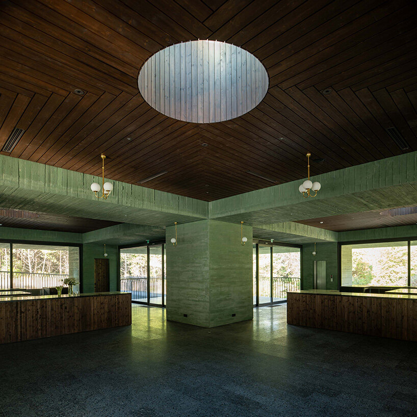 pezo von ellrichshausen raises field of inhabitable columns for restaurant in south korea