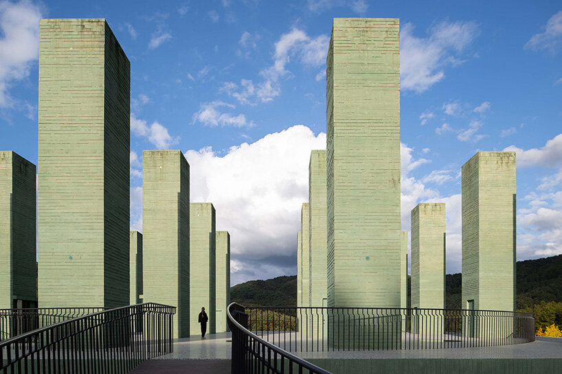 pezo von ellrichshausen raises field of inhabitable columns for restaurant in south korea