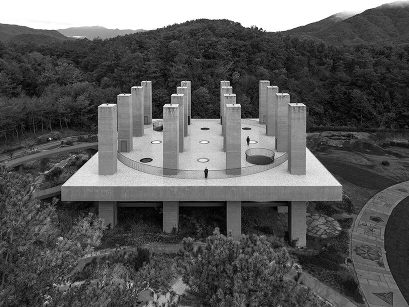 pezo von ellrichshausen raises field of inhabitable columns for restaurant in south korea