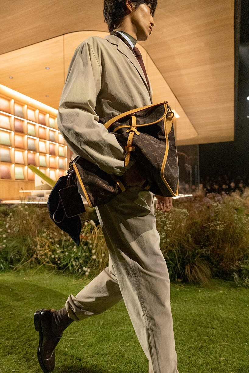pharrell williams and NOT A HOTEL stage louis vuitton's show around a prefabricated home
