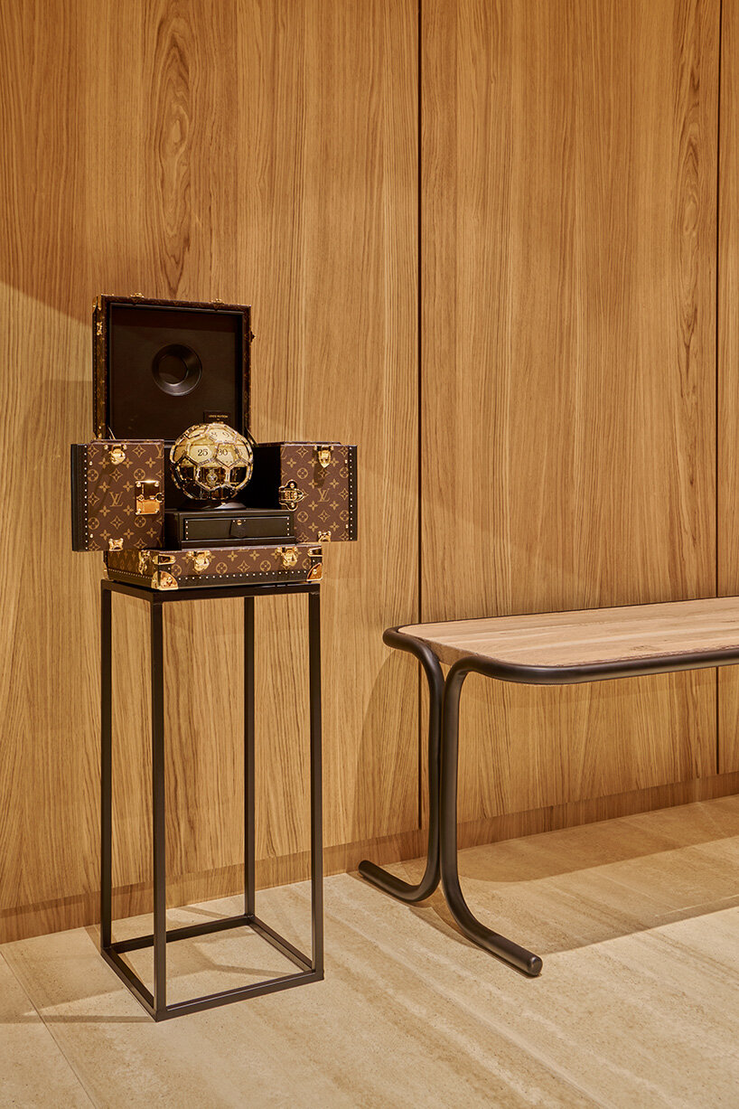 pharrell williams and NOT A HOTEL stage louis vuitton's show around a prefabricated home