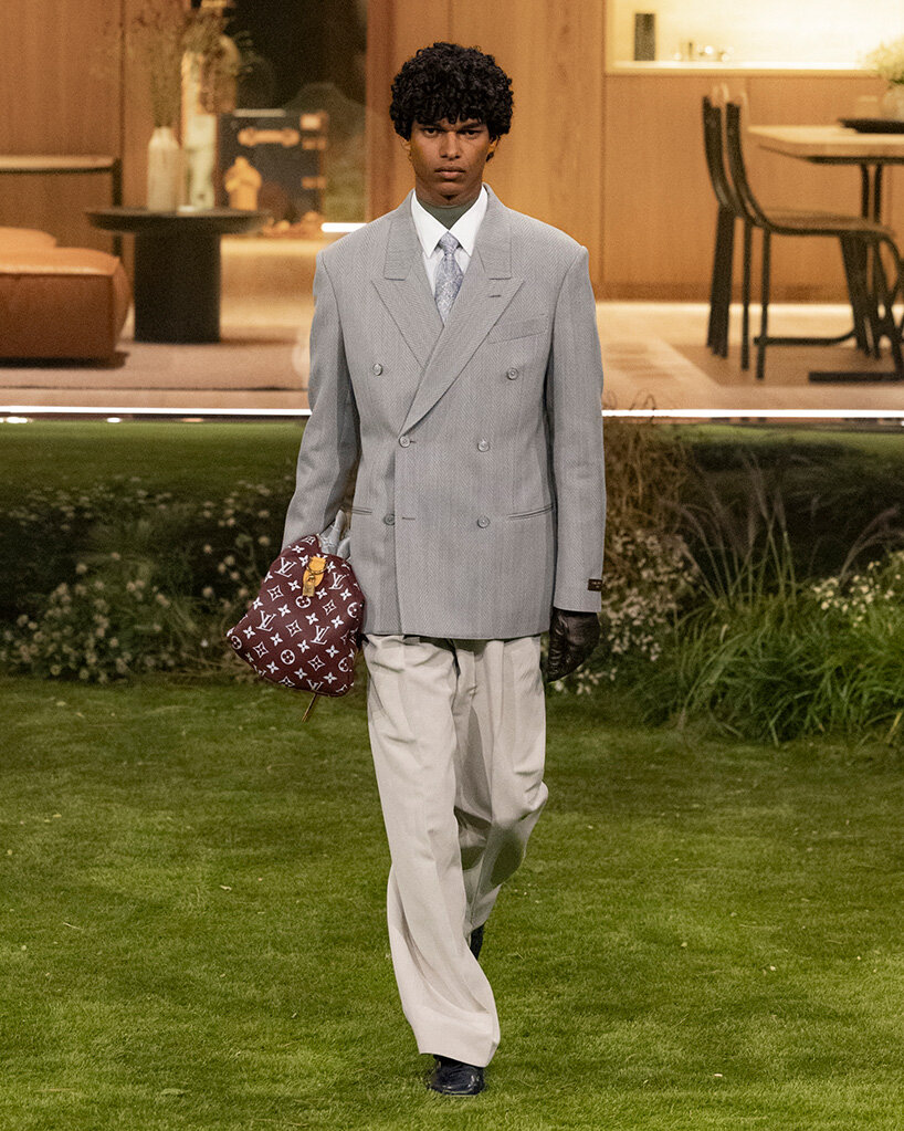 pharrell williams and NOT A HOTEL stage louis vuitton's show around a prefabricated home
