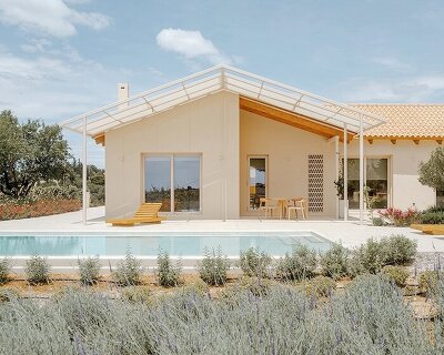 pitched timber roofs unify greek renovation project by local firm oblq