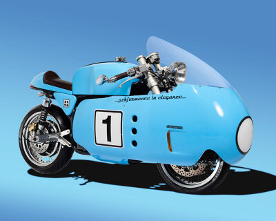 retro café racer with front shell draws design from 1950s british racing motorcycles