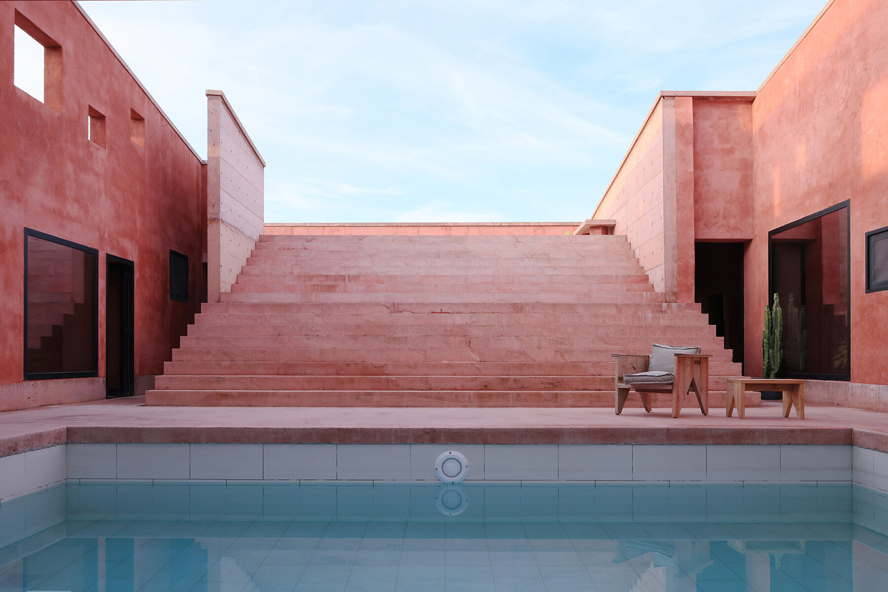 square-openings-facade-courtyard-centric-red-house-albania-gezim-pacarizi-studio-designboom-large01