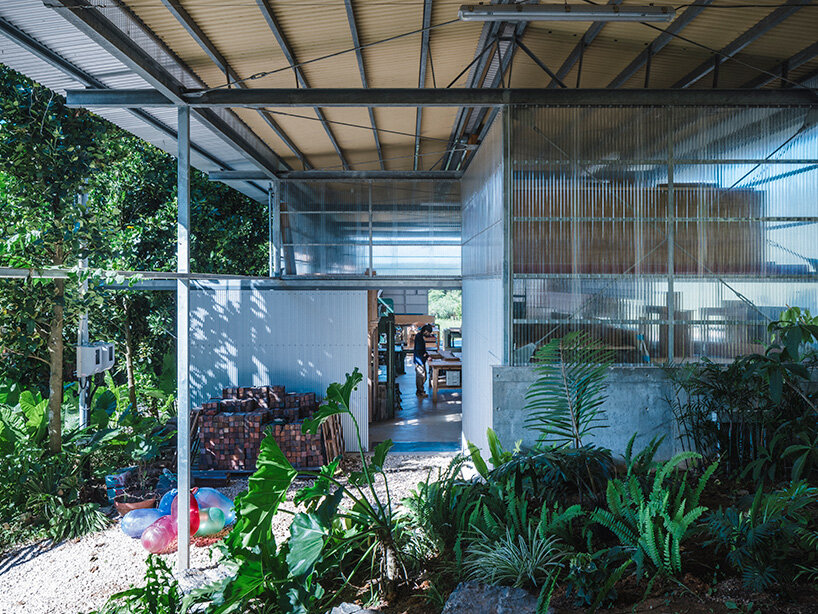 studio cochi architects wraps okinawa workspace in double-skin of insect netting and vinyl