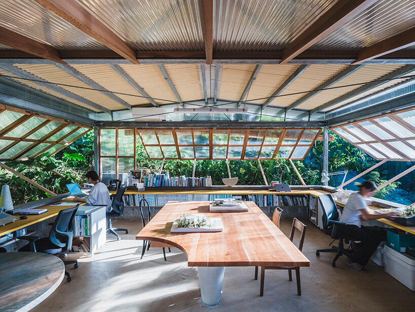 studio cochi architects wraps okinawa workspace in double-skin of insect netting and vinyl